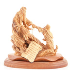 Jesus Christ statue hand carved from Bethlehem olive wood, 10 inch side angle of the olive wood sculpture