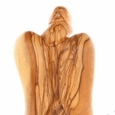 Angel olive wood statue hand carved in Bethlehem, 7.9 inch lifestyle photo on display