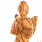 Angel olive wood statue hand carved in Bethlehem, 5.1 inch lifestyle photo on display