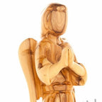 Olive wood nativity scene hand carved in Bethlehem, 7.5 inch three quarter view of the religious piece