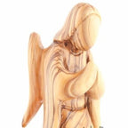 Olive wood nativity scene hand carved in Bethlehem, 6.1 inch three quarter view of the religious piece