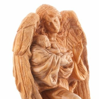Jesus Christ statue hand carved from Bethlehem olive wood, three quarter view of the religious piece