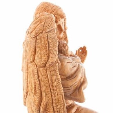 Jesus Christ statue hand carved from Bethlehem olive wood, close detail of the hand carved work