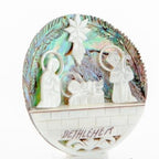 Olive wood nativity scene hand carved in Bethlehem, side angle of the mother of pearl sculpture