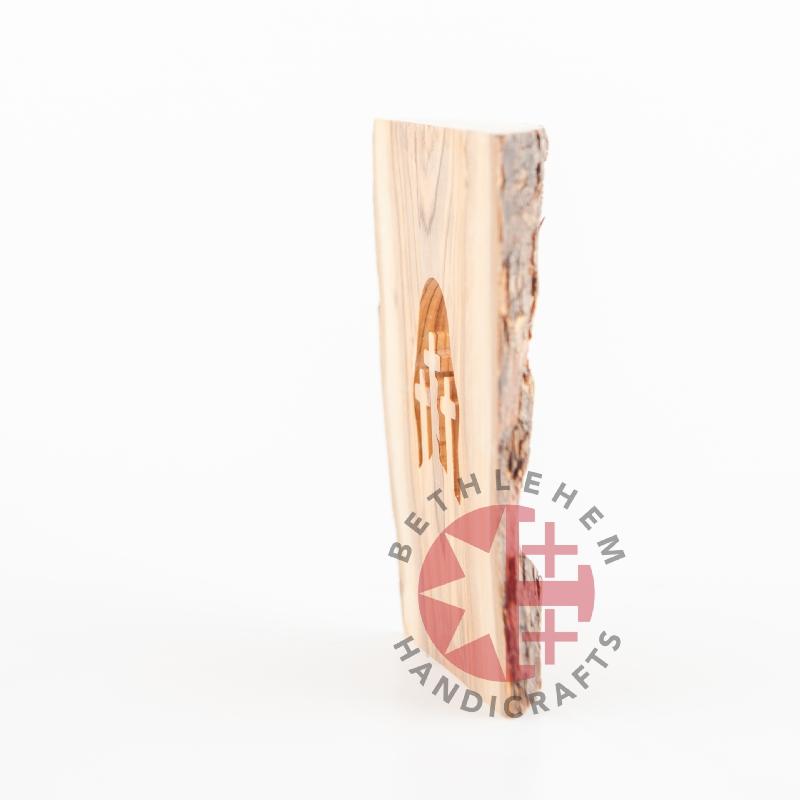 Olive wood Christmas ornament hand carved in Bethlehem, scale reference view