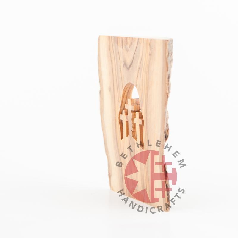 Olive wood Christmas ornament hand carved in Bethlehem, top angle showing detail of the craftsmanship