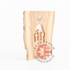 Olive wood Christmas ornament hand carved in Bethlehem, detail of the carved base