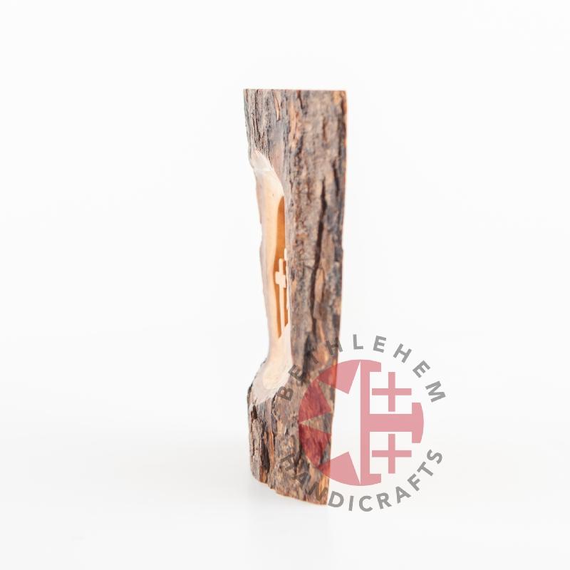 Olive wood Christmas ornament hand carved in Bethlehem, side view detail of the carved drapery