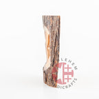 Olive wood Christmas ornament hand carved in Bethlehem, side view detail of the carved drapery