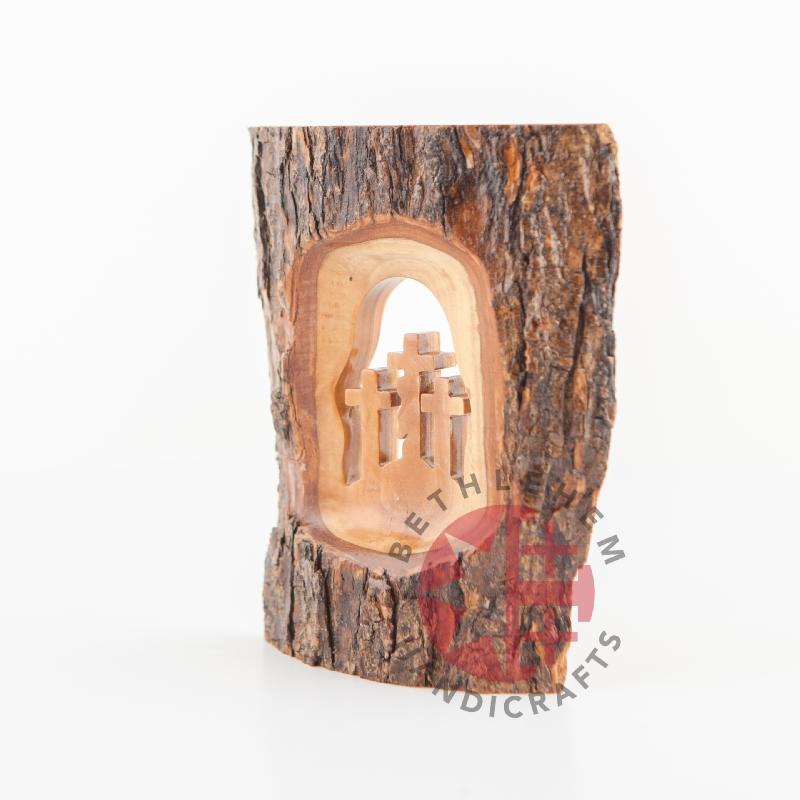 Olive wood Christmas ornament hand carved in Bethlehem, three quarter view of the religious piece