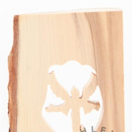 Olive wood Christmas ornament hand carved in Bethlehem, three quarter view of the religious piece