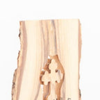 Olive wood crucifix hand carved in Bethlehem, three quarter view of the religious piece