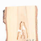 Olive wood Christmas ornament hand carved in Bethlehem, close detail of the hand carved work