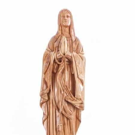 Car mirror olive wood rosary from Bethlehem Holy Land, 30 inch close up showing the olive wood grain