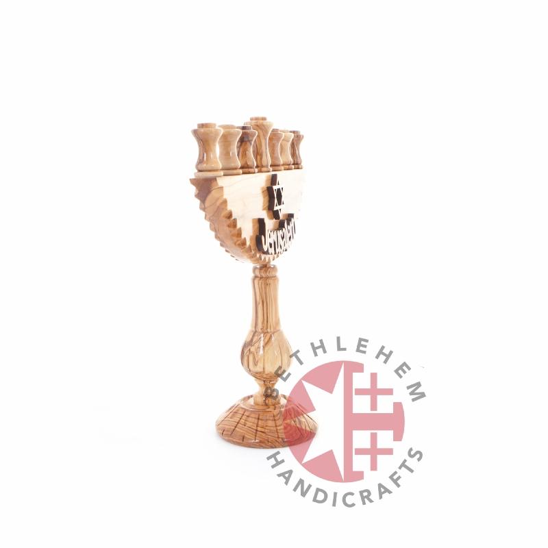 Religious gift from Bethlehem hand made in the Holy Land, side view detail of the carved drapery