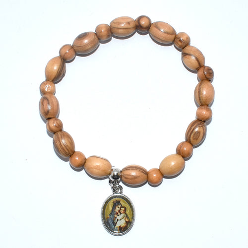 Olive wood rosary hand made in Bethlehem Holy Land, side angle of the olive wood sculpture