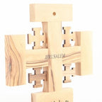 Olive wood wall cross hand carved in Bethlehem, three quarter view of the religious piece