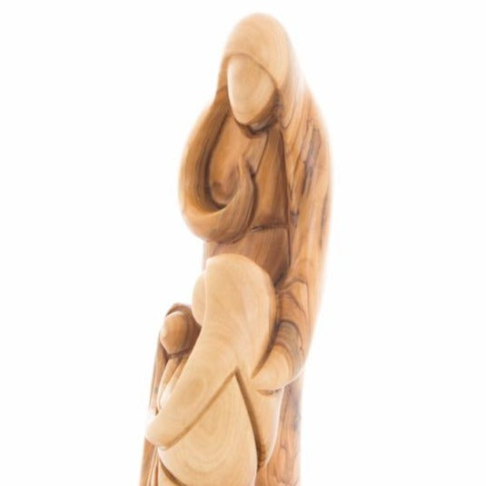 Olive wood nativity scene hand carved in Bethlehem, 10 inch three quarter view of the religious piece
