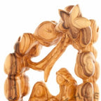 Olive wood nativity scene hand carved in Bethlehem, 8.7 inch natural light photo of the piece