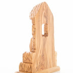 Olive wood nativity scene hand carved in Bethlehem, 8.5 inch opposite side angle of the religious sculpture