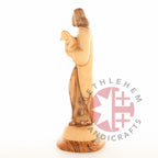 Good Shepherd statue hand carved from Bethlehem olive wood, 10 inch side view detail of the carved drapery
