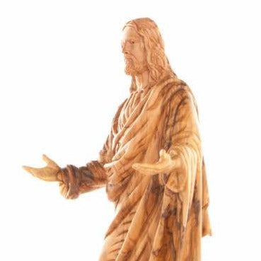 Jesus Christ statue hand carved from Bethlehem olive wood, 13.4 inch three quarter view of the religious piece
