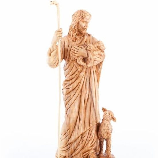 Good Shepherd statue hand carved from Bethlehem olive wood, 19 inch three quarter view of the religious piece
