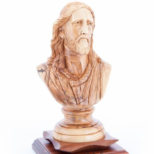 Jesus Christ statue hand carved from Bethlehem olive wood, 9.8 inch three quarter view of the religious piece