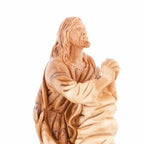 Jesus Christ statue hand carved from Bethlehem olive wood, 9.1 inch three quarter view of the religious piece