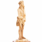 Jesus Christ statue hand carved from Bethlehem olive wood, 13 inch three quarter view of the religious piece