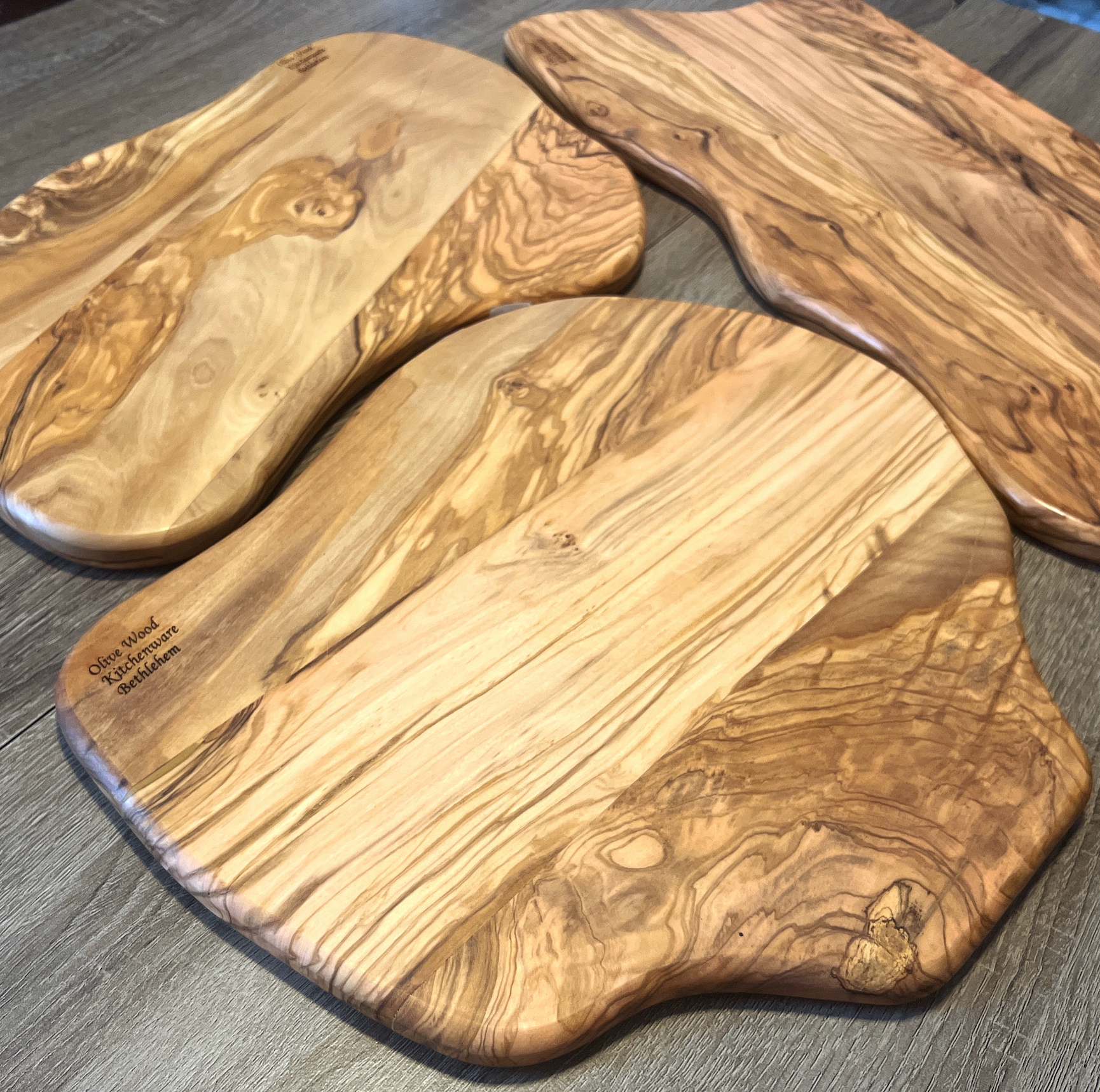 https://bethlehemhandicrafts.com/cdn/shop/products/Cutting-Board-Charcuterie-Olive-wood_8.png?v=1684632176&width=1946