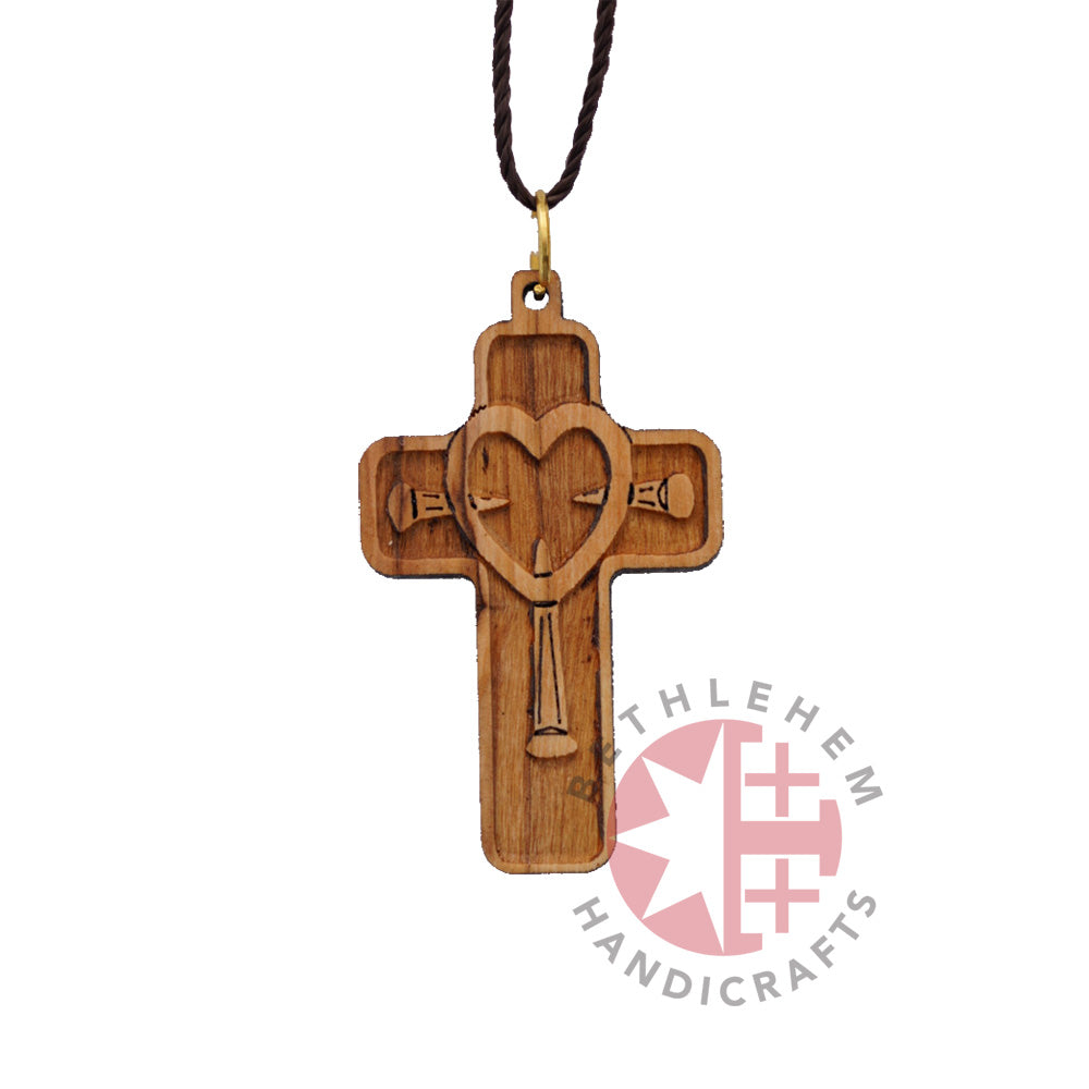 Religious jewelry hand made in Bethlehem Holy Land, side angle of the olive wood sculpture