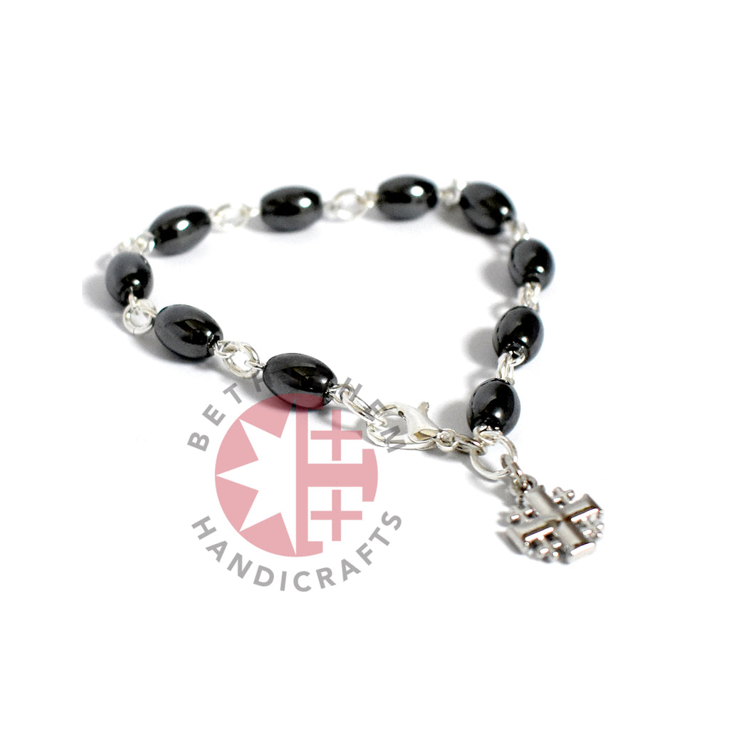Olive wood rosary hand made in Bethlehem Holy Land, three quarter view of the religious piece