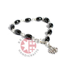 Olive wood rosary hand made in Bethlehem Holy Land, three quarter view of the religious piece