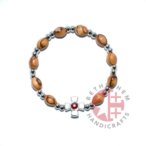Olive wood rosary hand made in Bethlehem Holy Land, side angle of the olive wood sculpture