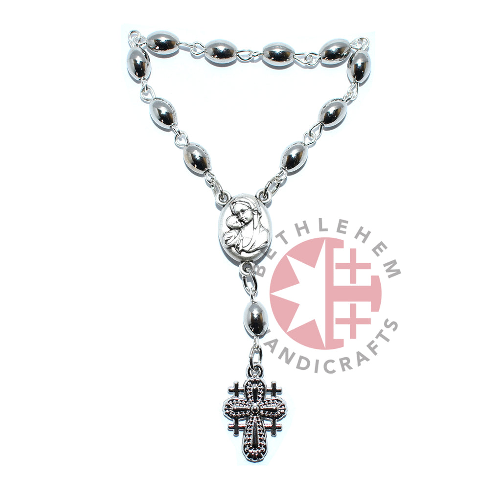 Finger rosary hand made in Bethlehem Holy Land, side angle of the olive wood sculpture