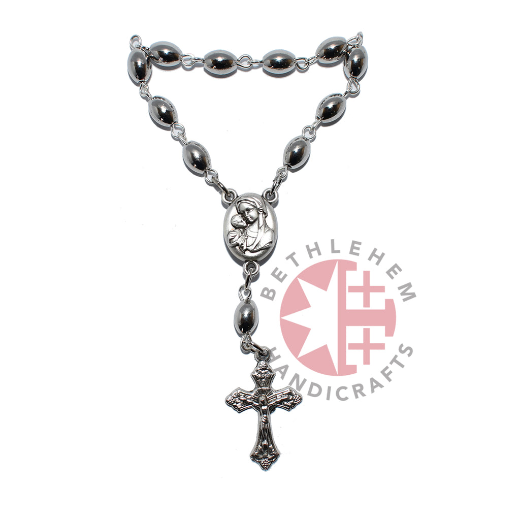 Finger rosary hand made in Bethlehem Holy Land, side angle of the olive wood sculpture