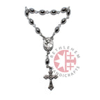 Finger rosary hand made in Bethlehem Holy Land, side angle of the olive wood sculpture