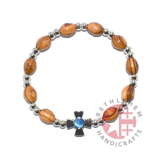 Olive wood rosary hand made in Bethlehem Holy Land, side angle of the olive wood sculpture