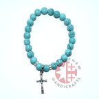 Olive wood rosary hand made in Bethlehem Holy Land, side angle of the olive wood sculpture
