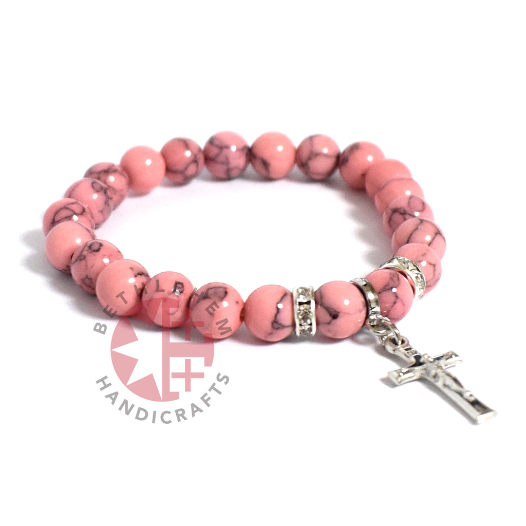 Olive wood rosary hand made in Bethlehem Holy Land, three quarter view of the religious piece
