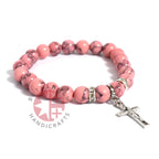 Olive wood rosary hand made in Bethlehem Holy Land, three quarter view of the religious piece