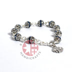 Olive wood rosary hand made in Bethlehem Holy Land, three quarter view of the religious piece