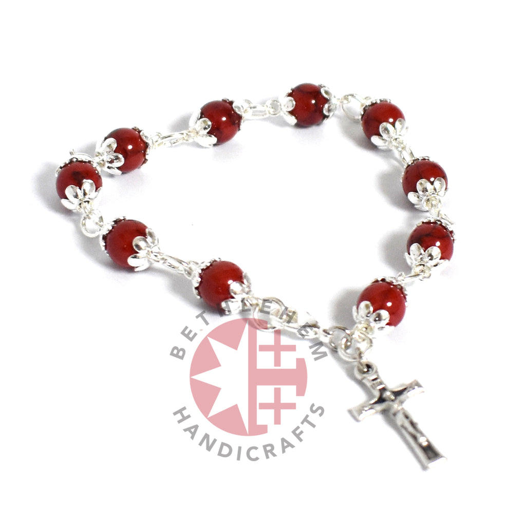 Olive wood rosary hand made in Bethlehem Holy Land, three quarter view of the religious piece