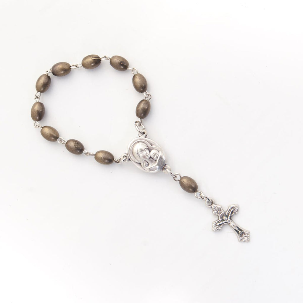 Finger rosary hand made in Bethlehem Holy Land, side angle of the olive wood sculpture
