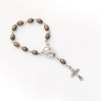 Finger rosary hand made in Bethlehem Holy Land, side angle of the olive wood sculpture