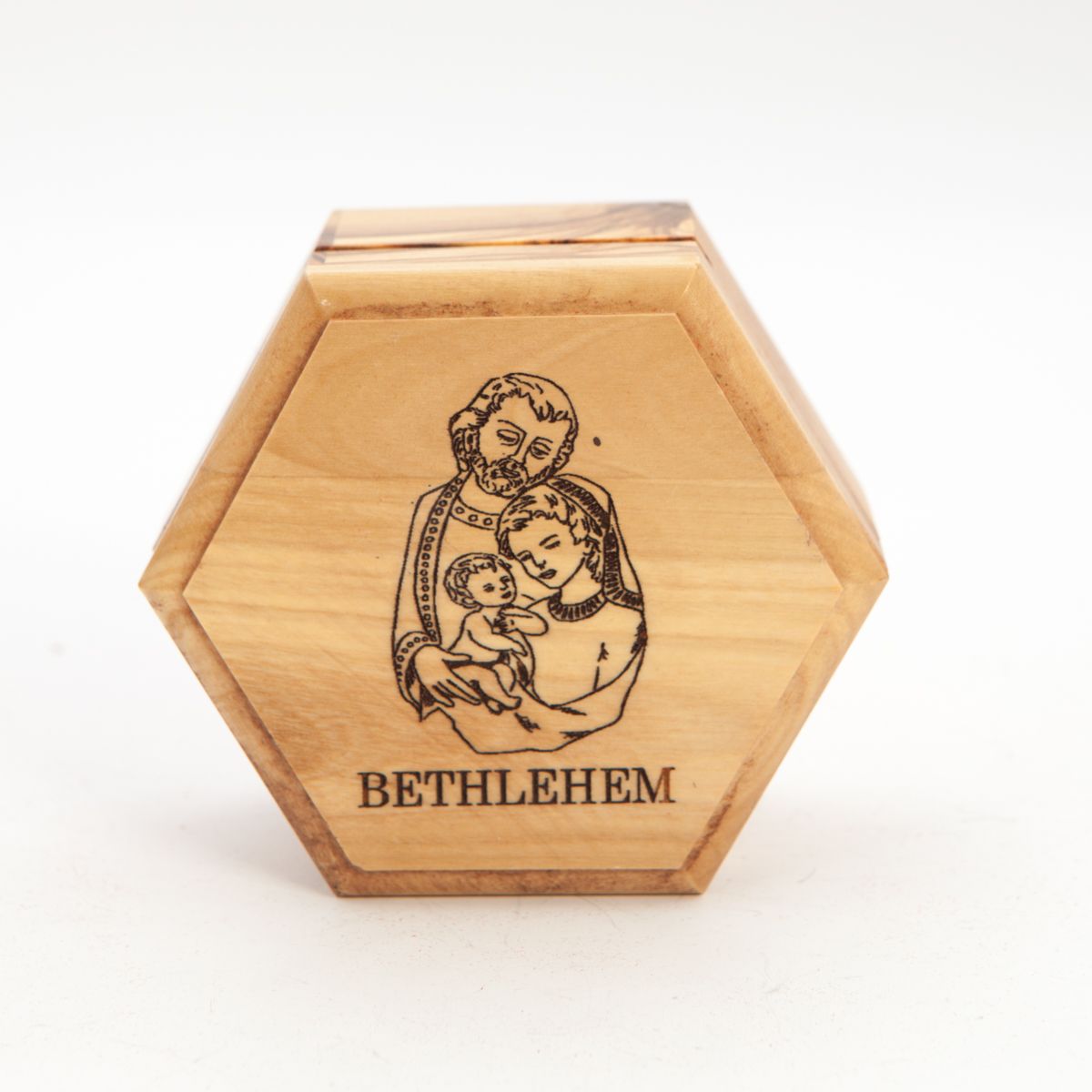 A wooden rosary holder with an engraved image of the Holy Family and the word 'Bethlehem' on the lid.