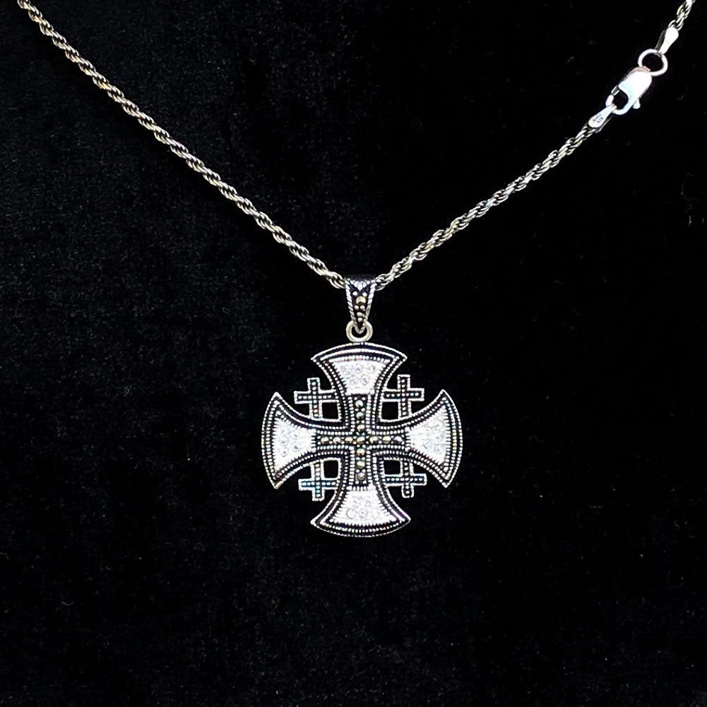 Religious jewelry hand made in Bethlehem Holy Land, side angle of the sterling silver sculpture