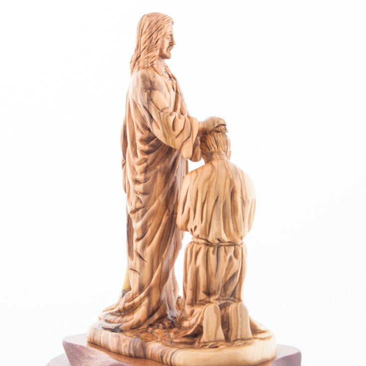 Jesus Christ statue hand carved from Bethlehem olive wood, 9.4 inch three quarter view of the religious piece