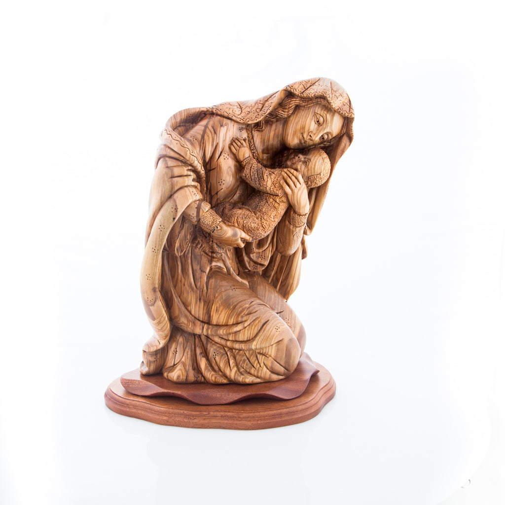 Virgin Mary olive wood statue from Bethlehem hand carved, 15 inch side angle of the olive wood sculpture